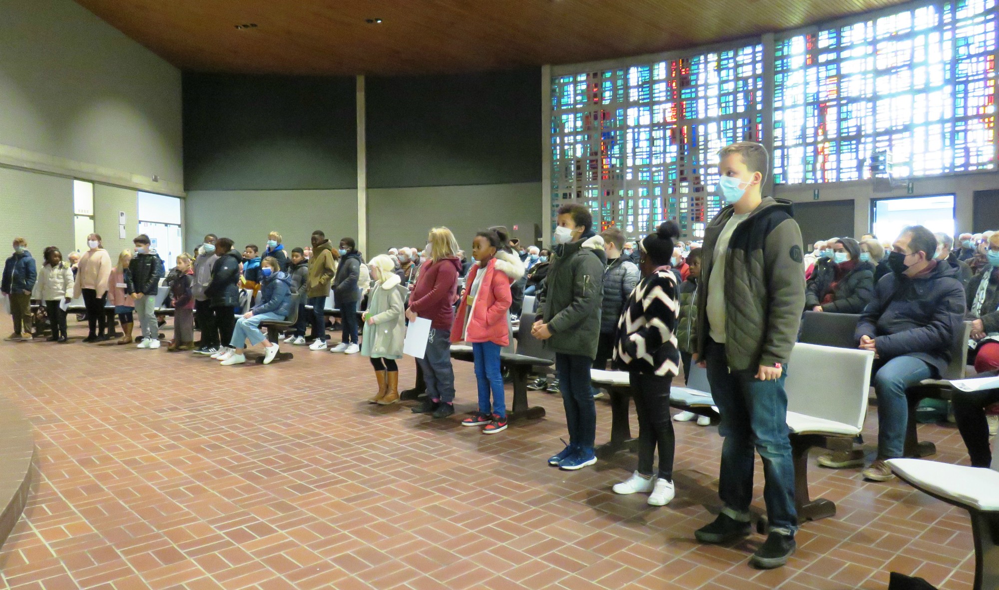 De eerste communicanten en vormelingen werden voorgesteld