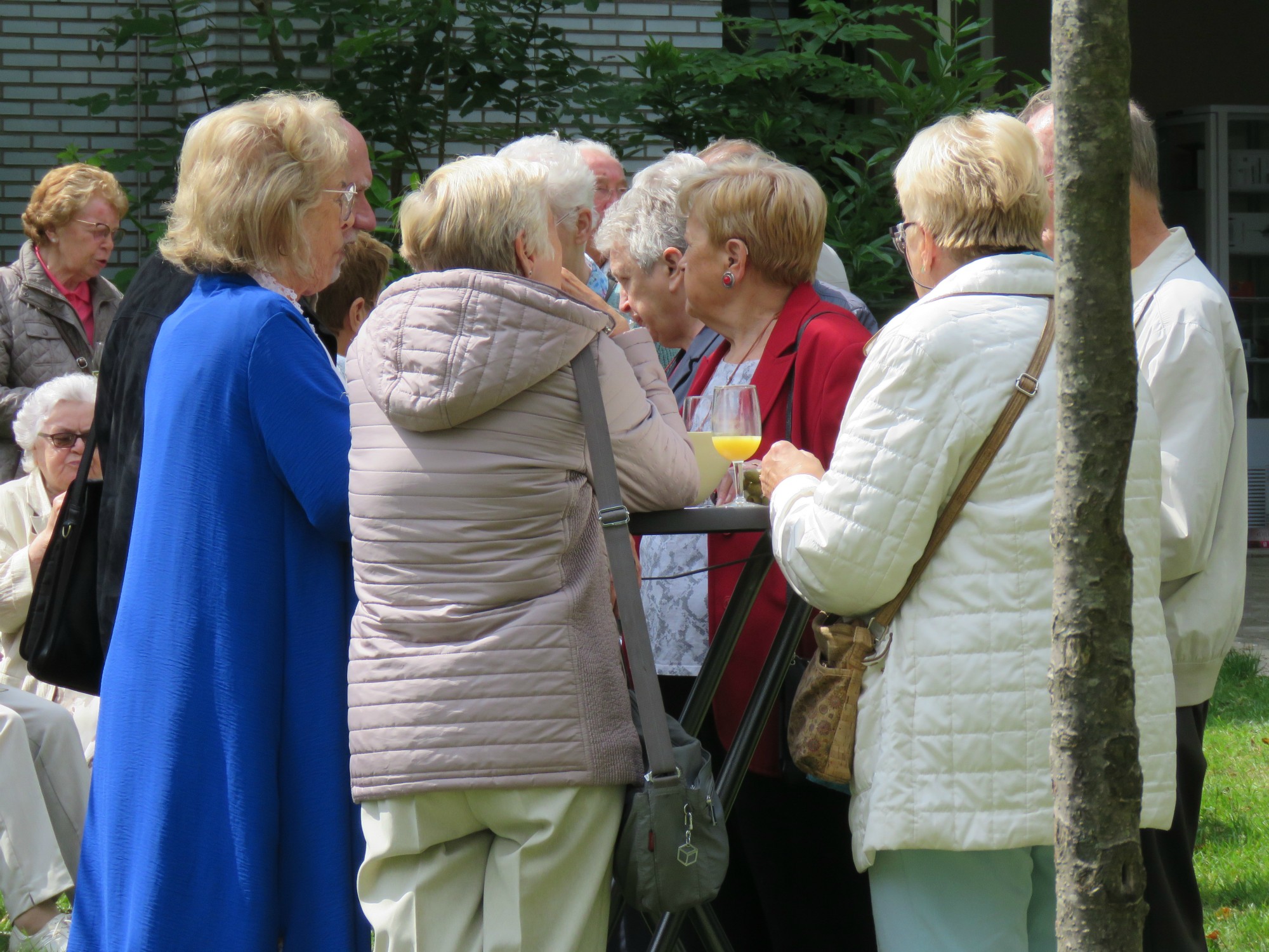 Viering Rerum Novarum - Receptie met deelmoment na de viering voor de Sint-Anna-ten-Drieënkerk, Antwerpen Linkeroever