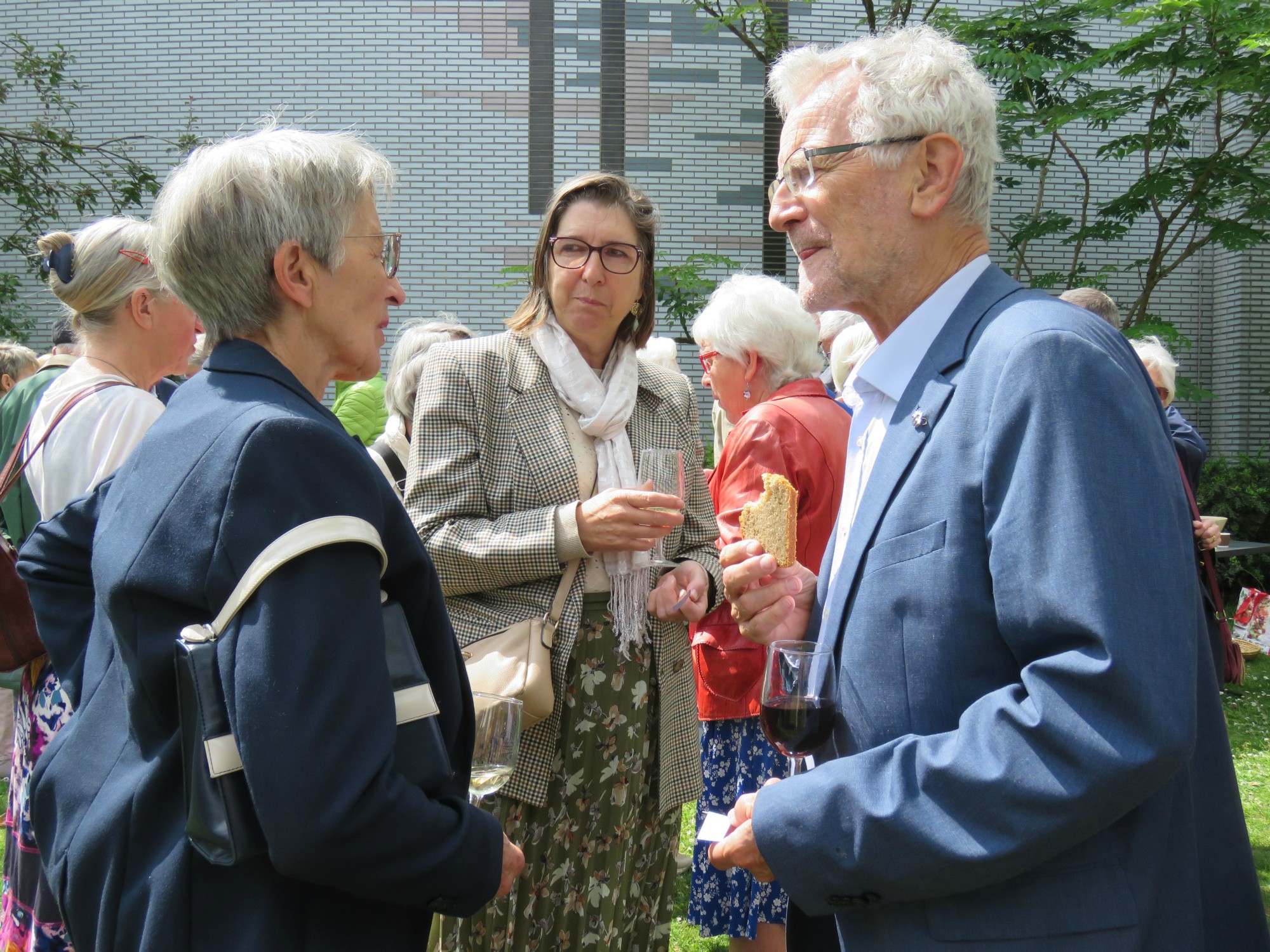 Viering Rerum Novarum - Receptie met deelmoment na de viering voor de Sint-Anna-ten-Drieënkerk, Antwerpen Linkeroever